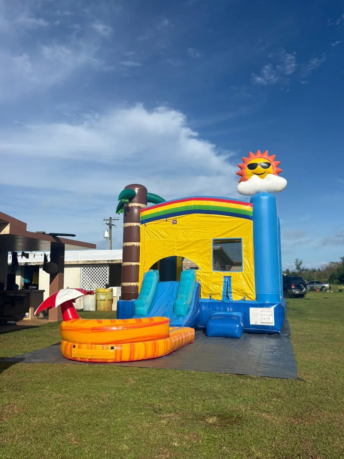 Beach Party Wet/Dry Combo rental setup on a Guam lawn
